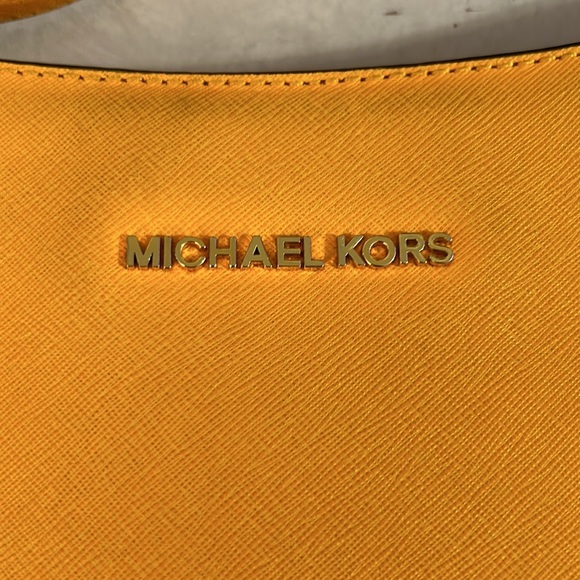 Michael Kors
Michael Michael Kors Yellow Leather Jet Set Travel Messenger Bag - Picture 2 of 6